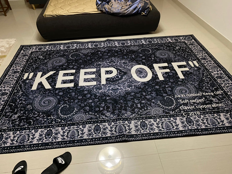 KEEP OFF letter carpet