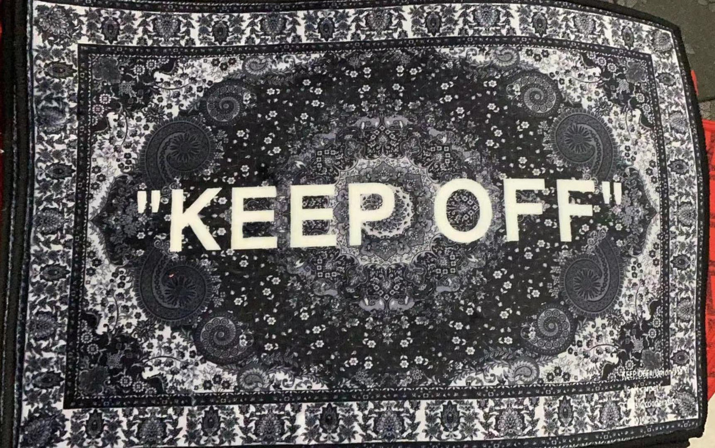KEEP OFF letter carpet